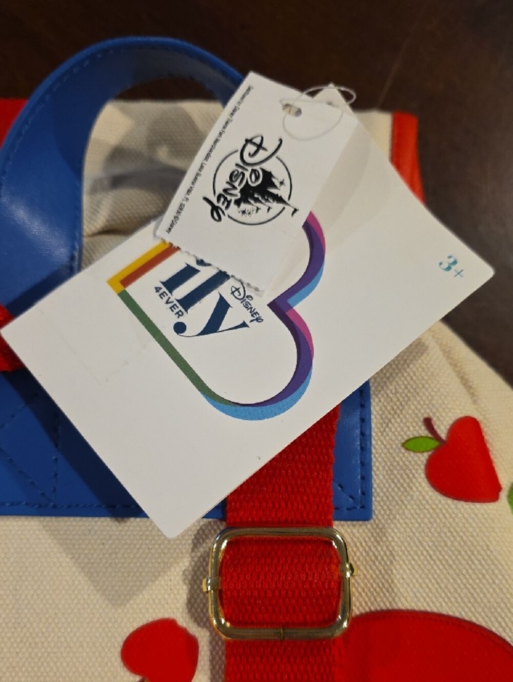 (J51) Disney Cream Backpack with Red Apple Print and Blue Strap - Picture 4 of 6